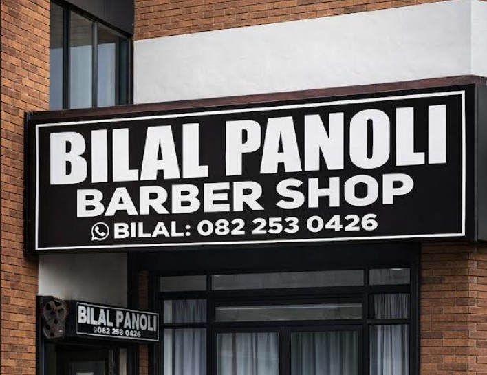 Close up of the Barber Shop Signage